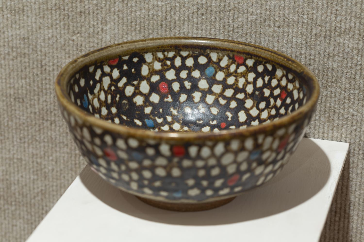 Keaton Wynn ceramics: a speckled bowl with an inlaid pattern